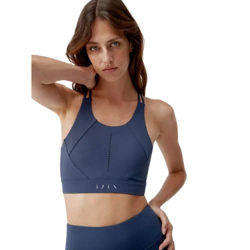 Top modelo saril en azul de la marca born living yoga